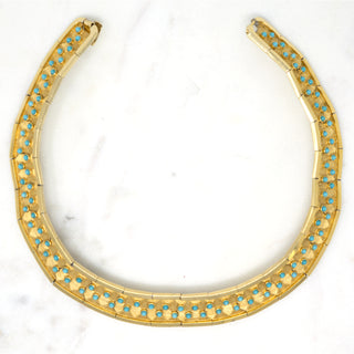 Egyptian Revival Choker, Boucher  Designer: Boucher  Material: gold plated metal, glass  Period: 1950s. Available at Fonfrege.com