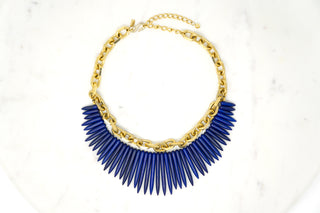Gold and Lapis Necklace Designer: Kenneth Jay Lane (KJL) Material: gold plated metal, bakelite, faux lapis lazuli. Available at Fonfrege.com