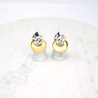 Draped Pendant Earrings, Les Bernard  Designer: Les Bernard  Material: chromium and gold plated metal  Period: 1980s. Available at Fonfrege.com