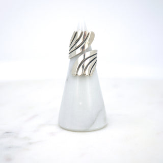 Deco Wave, R. Cazares  Designer: R. Cazares  Material: sterling silver  Period: 1940s  Size: 6. Available at Fonfrege.com