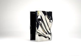 The Crush clutch minaudiere. Simulated chrome. Limited edition. Available on Fonfrege.com