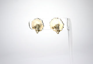 Designer: unsigned Period: Mid-century Dimensions: .75” Material: sterling, onyx, turquoise, coral Condition: Excellent  The cactus flower is an important symbol in Zuni culture, as the flower is a symbol of resilience in the face of the scorching heat of the desert. These elegant flowers are beautifully graphic, both flower and motif. Screw back. Available at Fonfrege.com