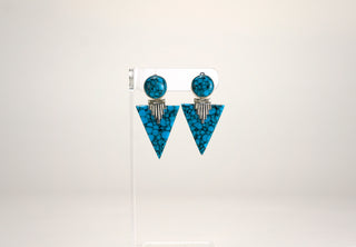 A beautifully geometric pair of art-deco earrings, made from composite turquoise and sterling silver (925). Marked Mexico, they are most likely from Taxco.