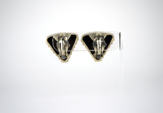 Designer: unknown Period: 1980 Dimensions: 1”x1” Material: sterling 925 Condition: Very good  We call these “Tiernado” because they are like a modernist vision of a tornado, brilliantly architectural, with great chunky heft that makes them instantly a statement. Clip on earrings. Available at Fonfrege.com