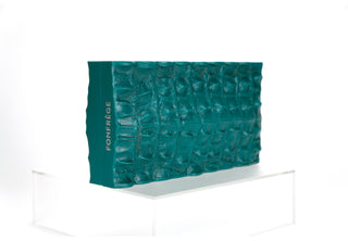 The Lagarto is our newest edition of minaudières to our Heritage Collection. Made from custom molded resin, the reptilian exterior is richly textured. Available in Arabian Green or Cabernet. Crocodile Clutch. Available at Fonfrege.com