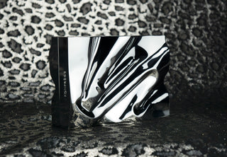 The Crush clutch minaudiere. Simulated chrome. Limited edition. Available on Fonfrege.com